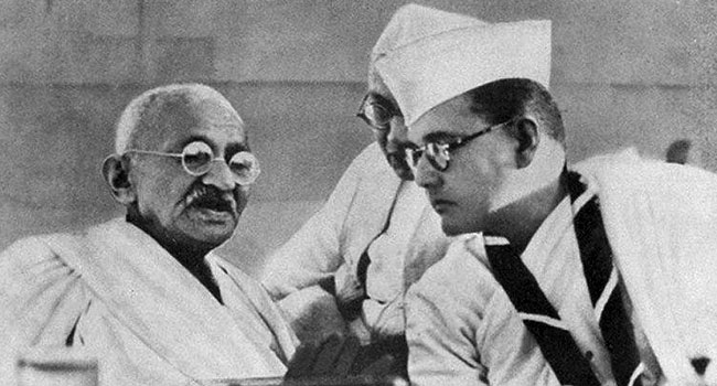 Mahatma Gandhi with Sarat Chandra Bose and Subhas Chandra Bose, 1938. Source: Wikimedia Commons